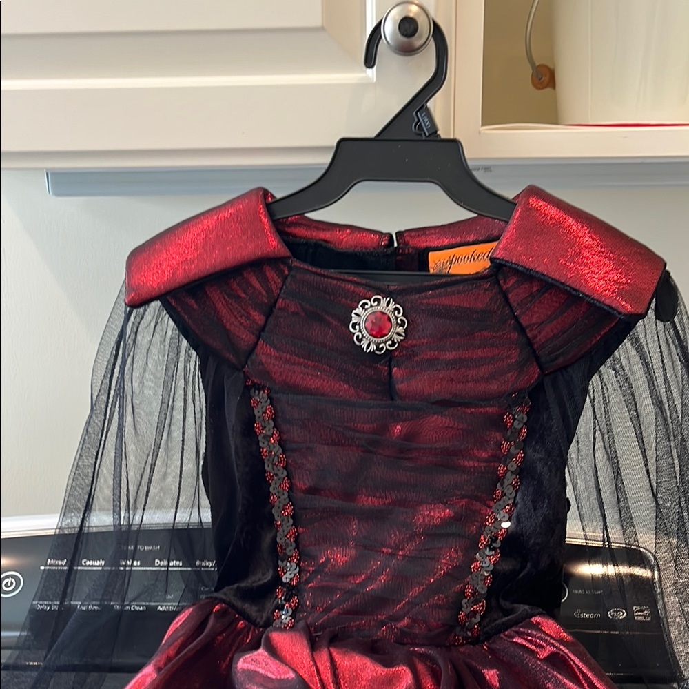 Spooked, 6x, black and red, devil headband, arm gloves.